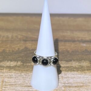 Three stone black onyx on Sterling silver